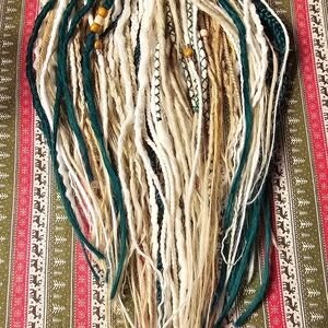 55 DE SYNTHETIC LOCS 25 TO 28 INCHES LONG